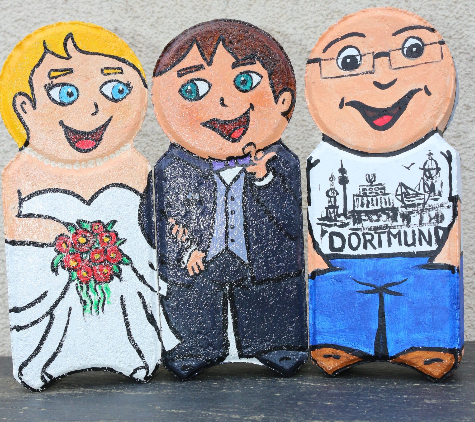 Susanne Weiß, „Gute Laune Figuren“, ca. 25x10x7 cm, Rasenkantsteine, Acrylmalerei, 2026